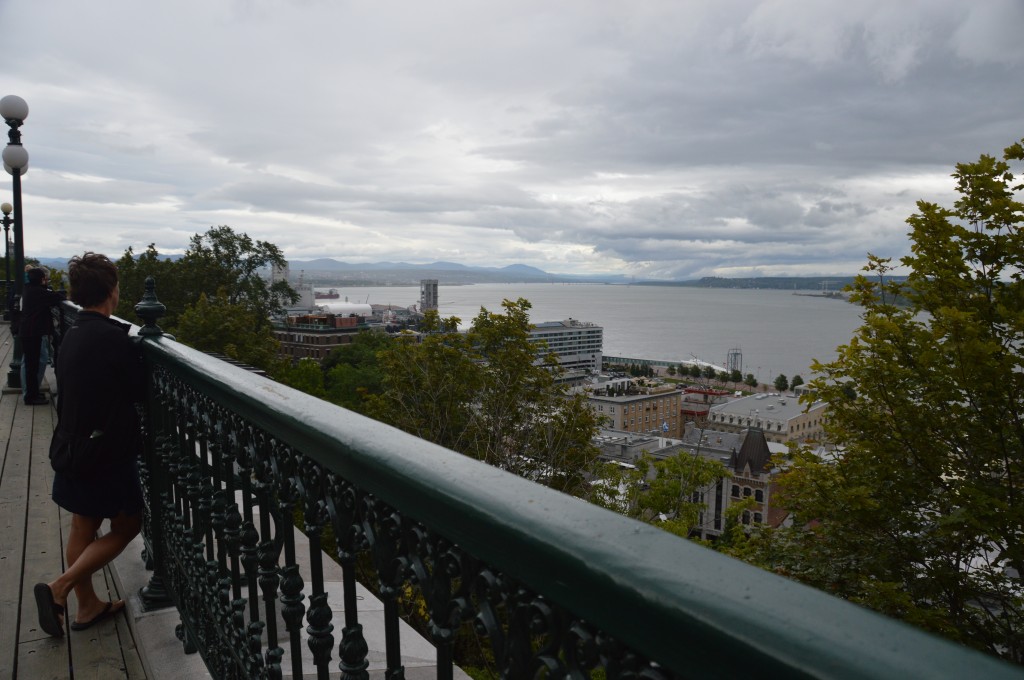 Joyce on the promenade at the foot of Chateau Frontenac peering east over St. Lawrence